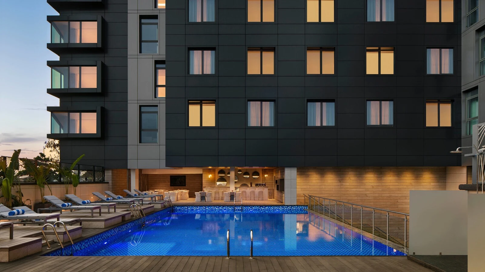 The outdoor pool at Lagos Marriott Hotel Ikeja at dusk